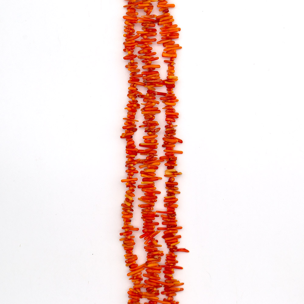 Фото товара коралл тонированный лососевый "иглы" 15*2 мм