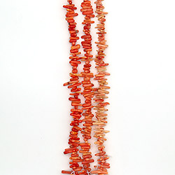 Фото товара коралл тонированный розовый "иглы" 17*4 мм