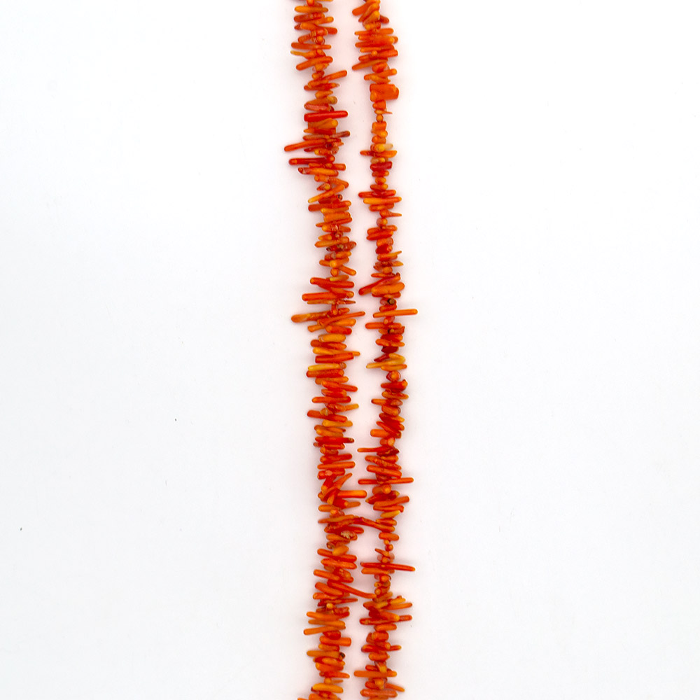 Фото товара коралл тонированный "иглы" 15*3 мм