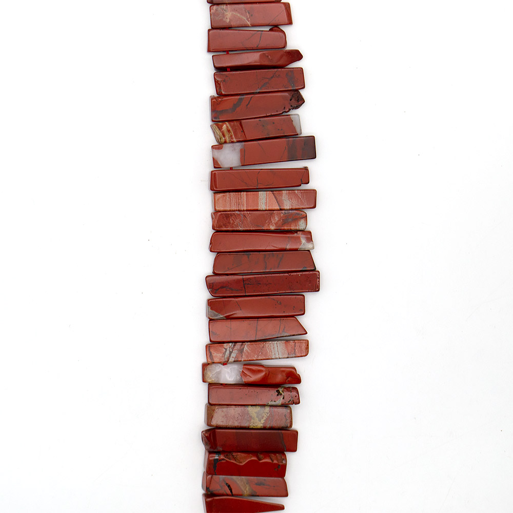 Фото товара яшма кирпичная пластины на увеличение от 32*10 до 53*10 мм