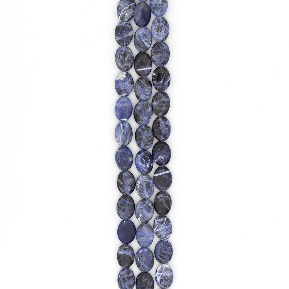 Фото товара содалит темный таблетка 20*14 мм