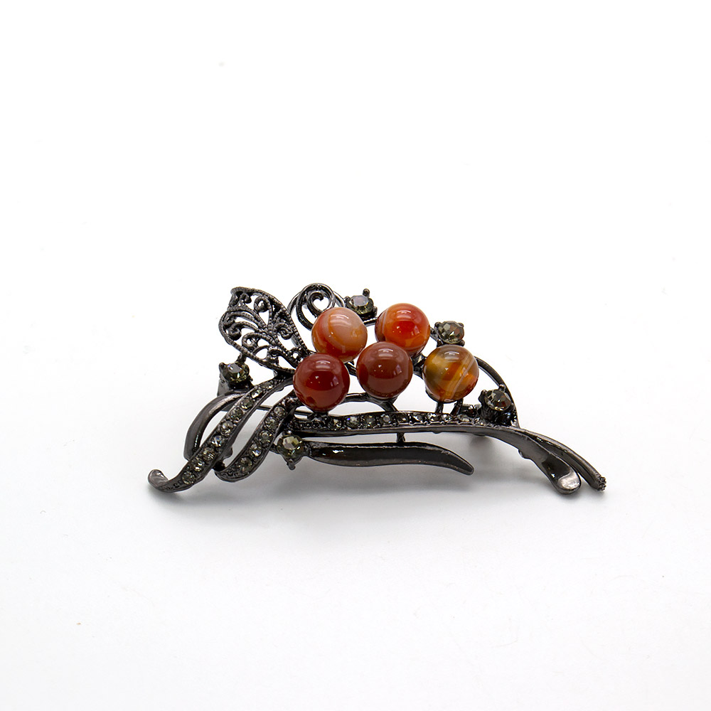 Фото товара брошь "ажурный лист 5 камней" сердолик а0147