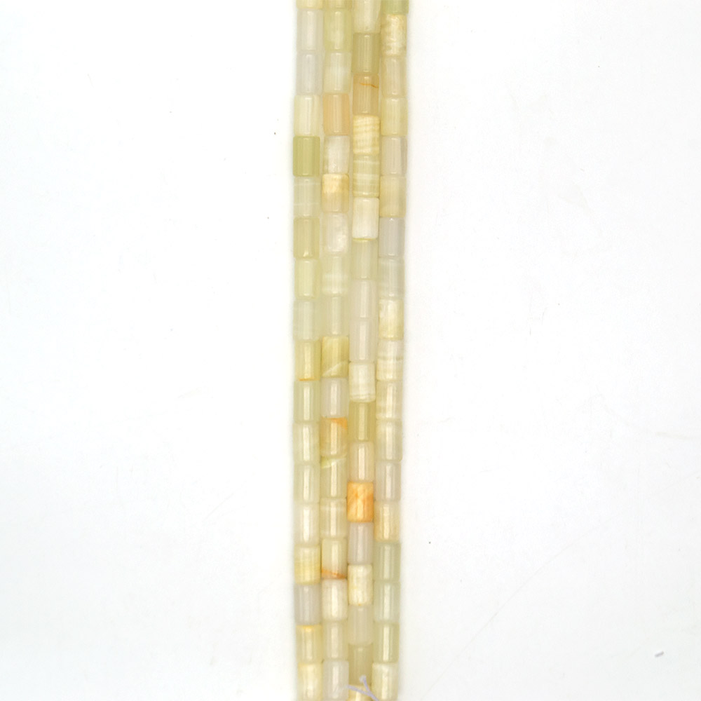 Фото товара оникс белый цилиндр 12*8 мм