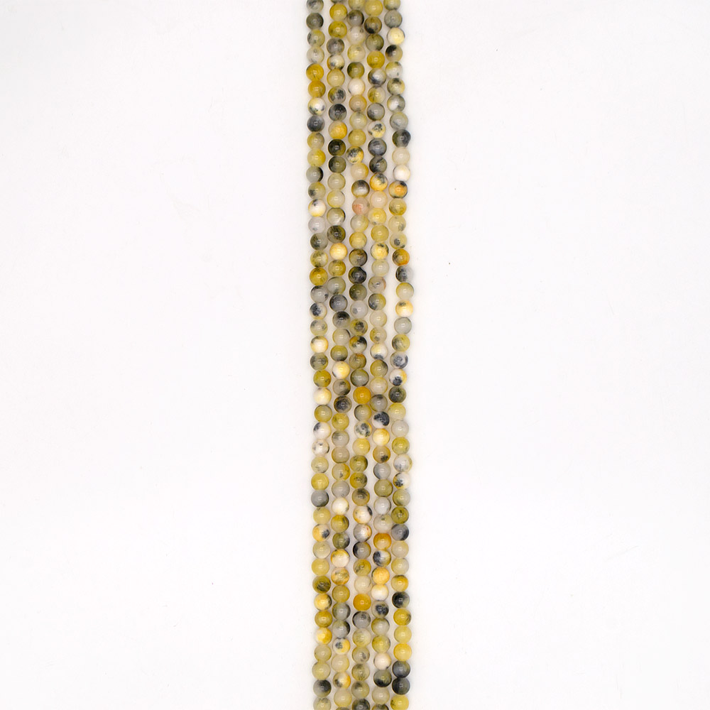 Фото товара кальцит пигментированный желтый с черным 6 мм