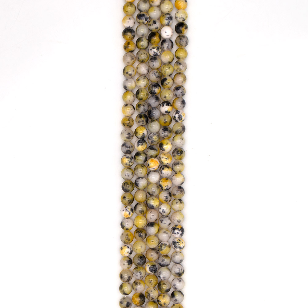 Фото товара кальцит пигментированный желтый с черным 10 мм