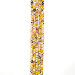 Кальцит пигментированный желтый с черным 8 мм