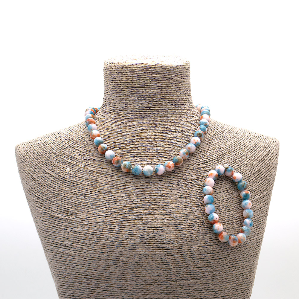 Фото товара бусы,браслет из кальцита пигментированного голубого с оранжевым шар