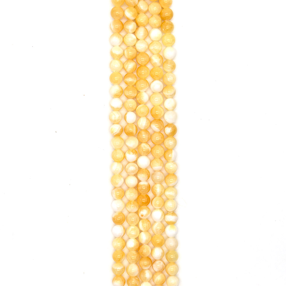 Фото товара кальцит пигментированный бледно-желтый с белым 10 мм