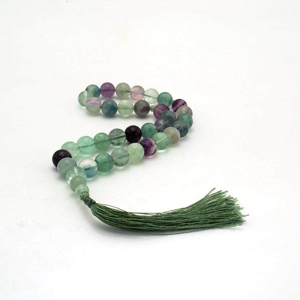 Фото товара четки из флюорита 12 мм 33 бусины