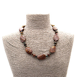 Фото товара бусы из яшмы тигровой красной таблетка овальная витая граненая