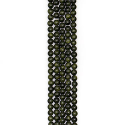 Фото товара кальцит тонированный темно-зеленый 10 мм