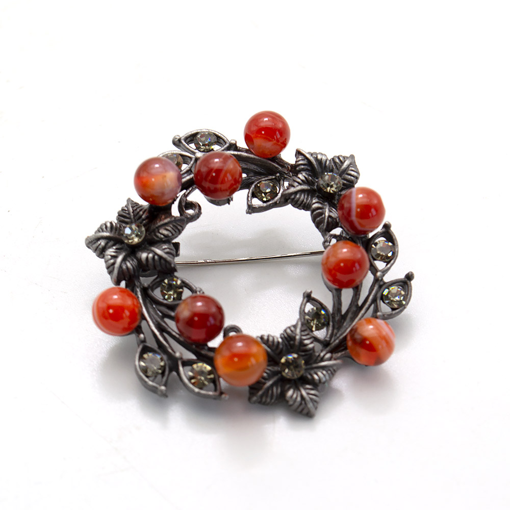 Фото товара брошь "венок с цветами" сердолик а0098