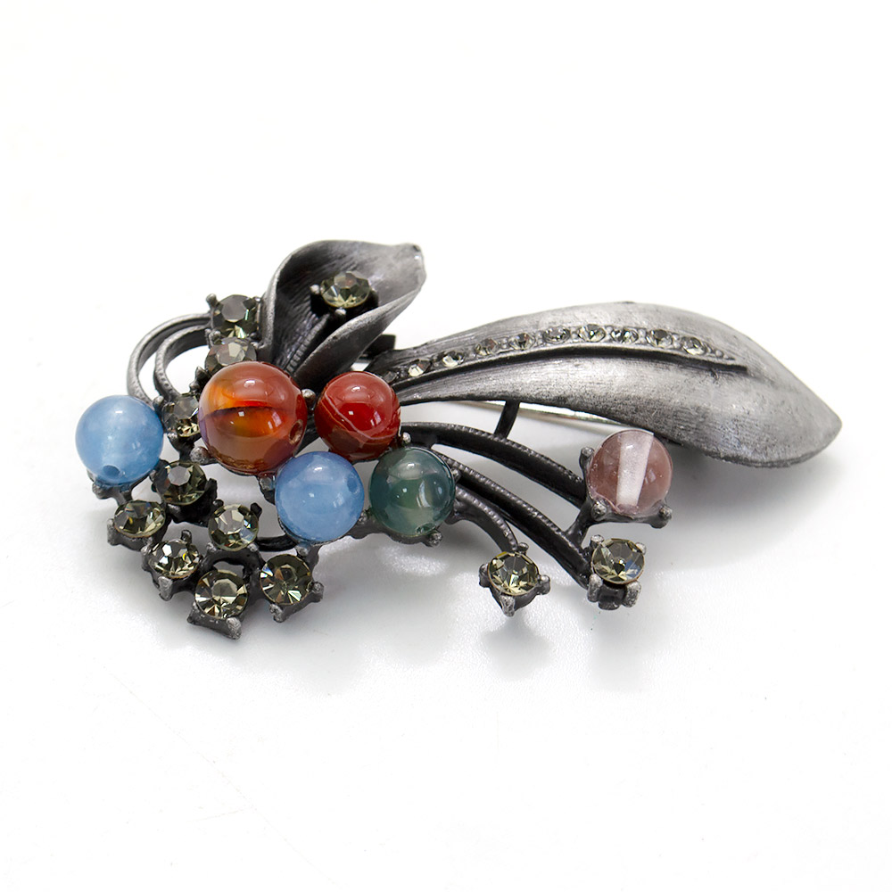 Фото товара брошь "бутон с листом" микс камней а0171