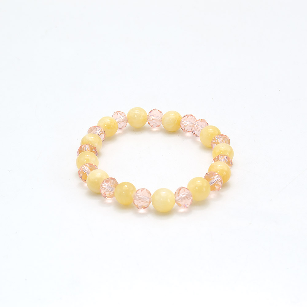 Фото товара браслет из бледно-желтого кальцита с розовым цирконом 8мм