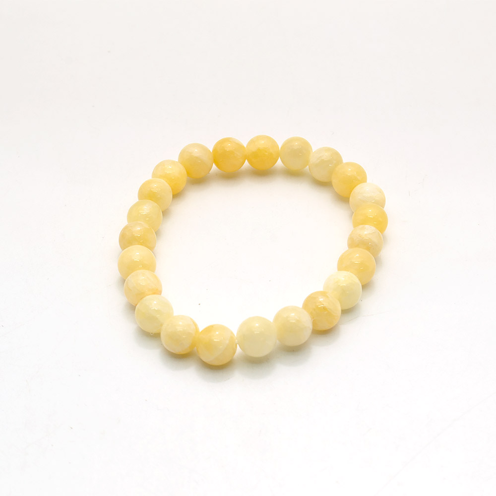 Фото товара браслет из кальцита тонированного светло-желтым шар