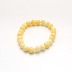 Браслет из кальцита тонированного светло-желтым шар