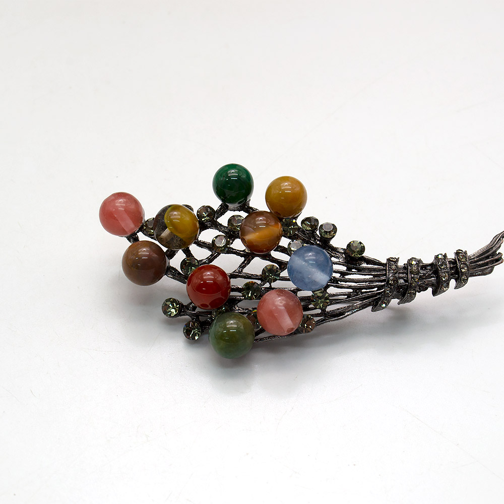 Фото товара брошь "букет с лентой" микс камней а0185