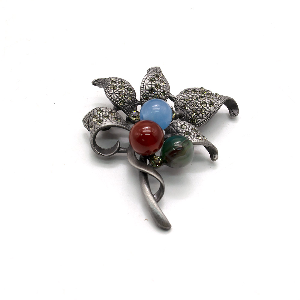 Фото товара брошь "пять лепестков" микс камней а0198