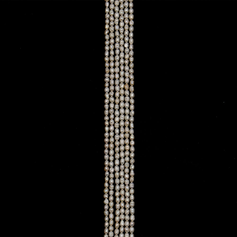 Фото товара жемчуг белый "рис" 5*3 мм