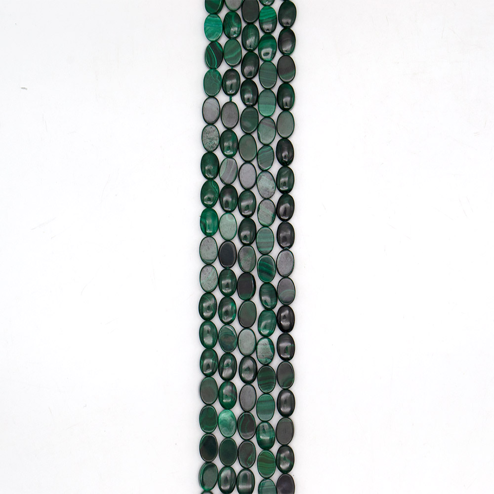 Фото товара малахит натура кабошон овальный 12*8 мм