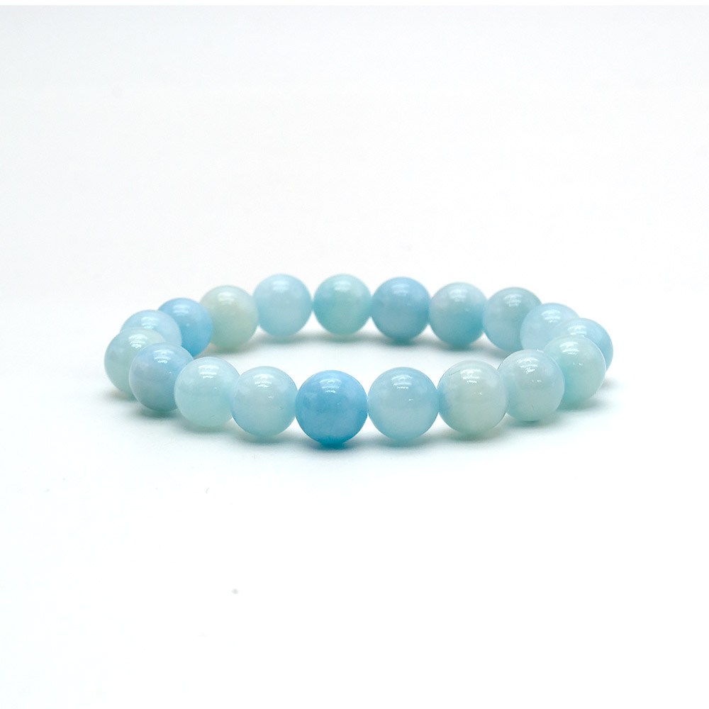 Фото товара браслет из кальцита тонированного голубой микс шар